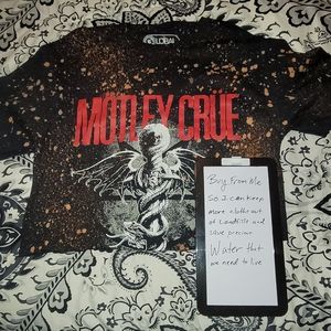 Motley cru distressed crop top never worn. SIZE Small